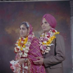 [Photo of Baldave Sidhu, Jatinder Kosa and their wedding guests]