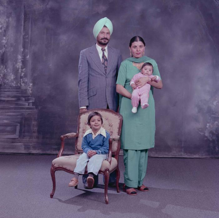 [Group portrait of Darshan Dhaliwal, an unidentified woman and two unidentified children]