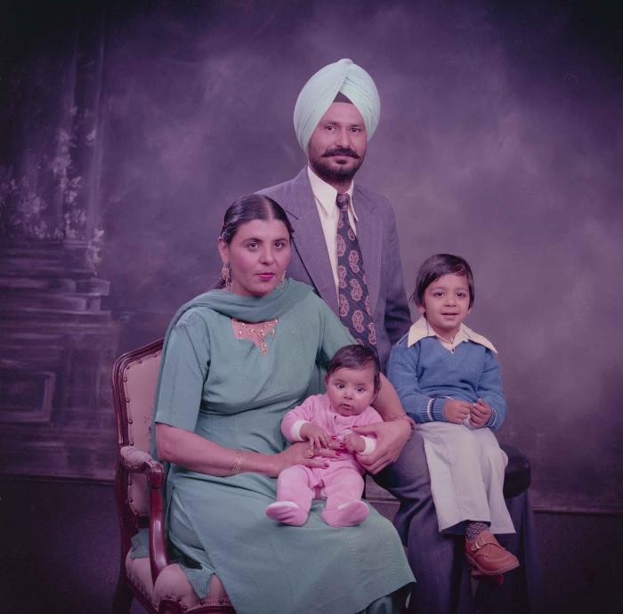 [Group portrait of Darshan Dhaliwal, an unidentified woman and two unidentified children]