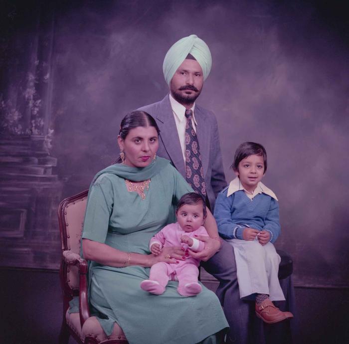 [Group portrait of Darshan Dhaliwal, an unidentified woman and two unidentified children]