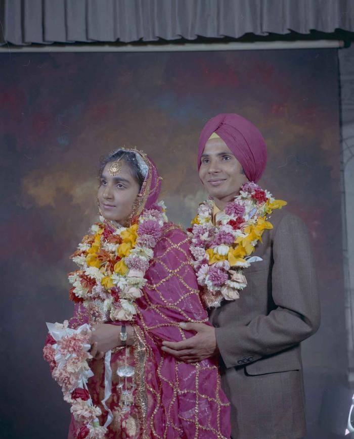 [Group portrait of H.S. Dhaliwal and an unidentified bride]
