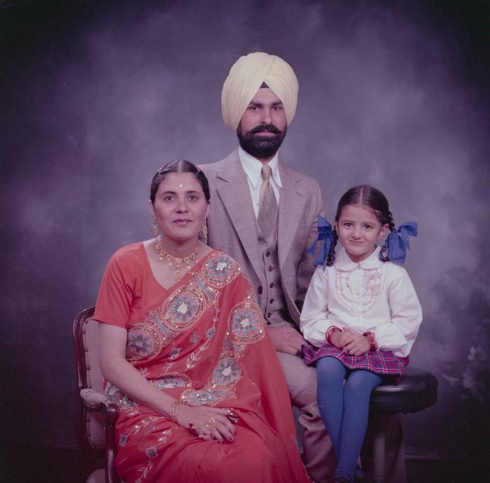[Group portrait of Harpal Dhaliwal, an unidentified woman and an unidentified child]