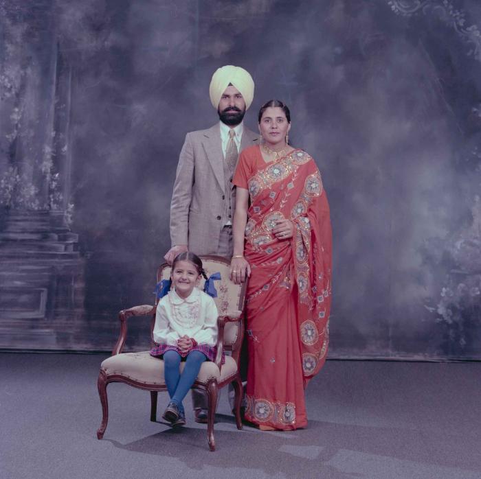 [Group portrait of Harpal Dhaliwal, an unidentified woman and an unidentified child]
