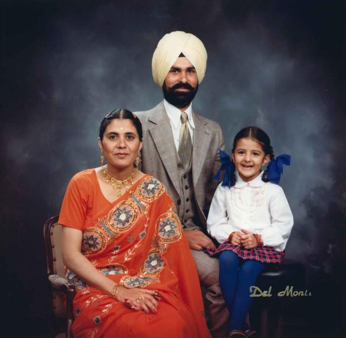 [Group portrait of Harpal Dhaliwal, an unidentified woman and an unidentified child]