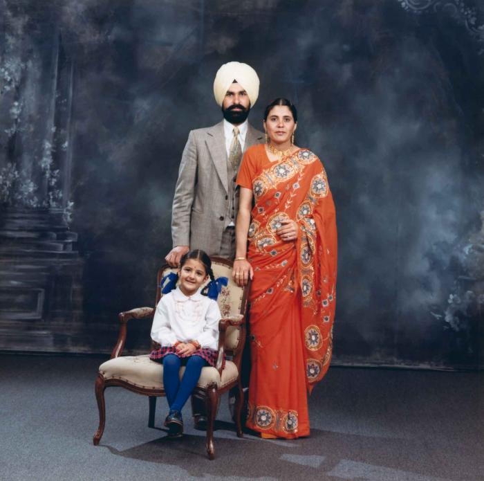 [Group portrait of Harpal Dhaliwal, an unidentified woman and an unidentified child]