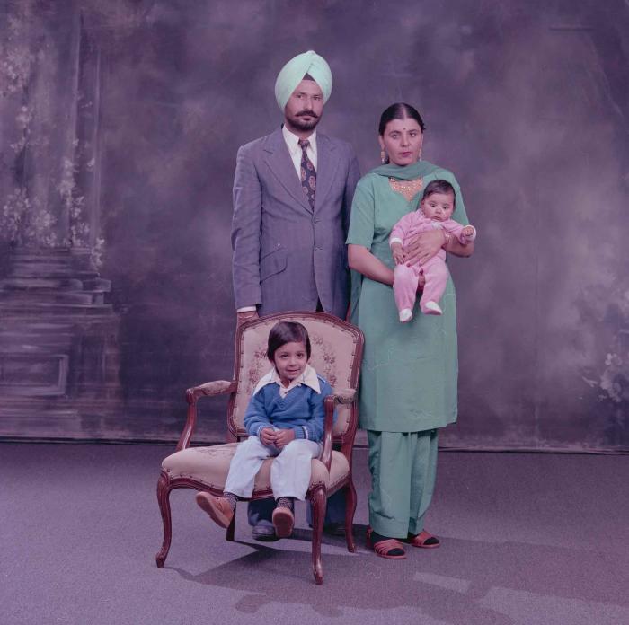 [Group portrait of Darshan Dhaliwal, an unidentified woman and two unidentified children]