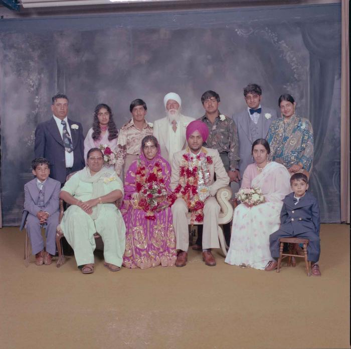 [Group portrait of Balbir Dhami, Inderjit Neger and wedding guests]
