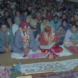 [Photo of Baldave Sidhu and the wedding guests]