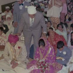 [Photo of Narwal Sidhu and the wedding guests]