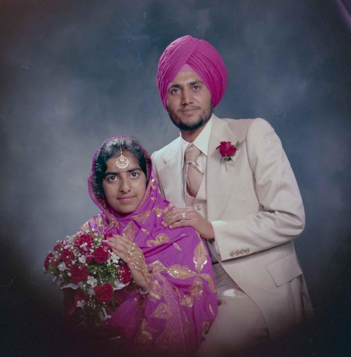 [Group portrait of Balbir Dhami and Inderjit Neger]