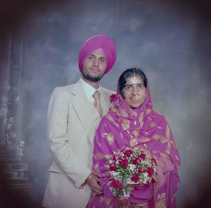 [Group portrait of Balbir Dhami and Inderjit Neger]