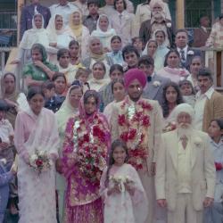 [Photo of Baldave Sidhu, Jatinder Kosa and their wedding guests]