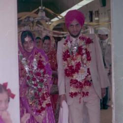 [Photo of Ajmer S. Sidhu and wedding guests]