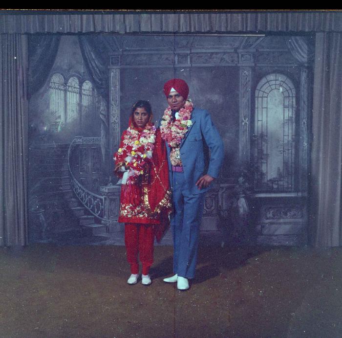 [Group portrait of Daljit Dhaliwal and an unidentified bride]