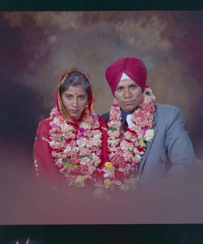 [Group portrait of Daljit Dhaliwal and an unidentified bride]