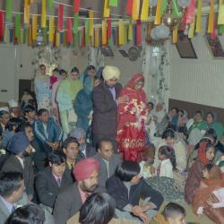 [Group portrait of Baldave Sidhu, Jatinder Kosa and their wedding guests]
