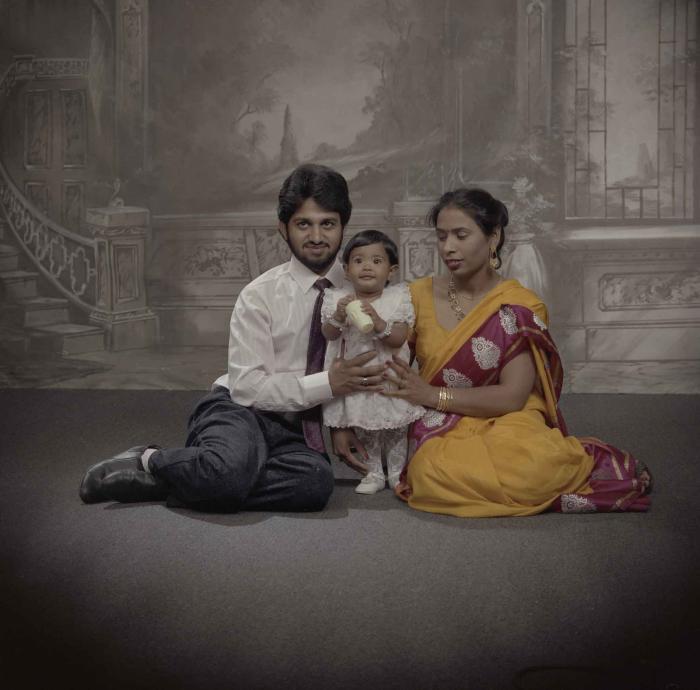 [Portrait of Anju Dhatt, Ashwani Dhaswan and an unidentified child]