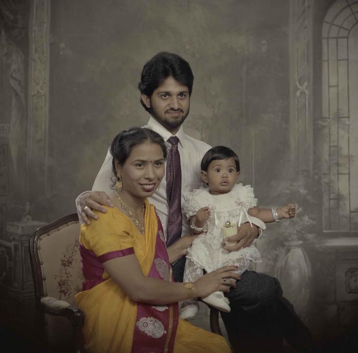 [Portrait of Anju Dhatt, Ashwani Dhaswan and an unidentified child]