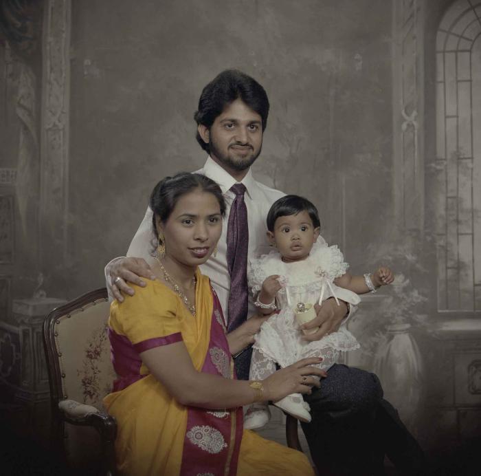 [Portrait of Anju Dhatt, Ashwani Dhaswan and an unidentified child]