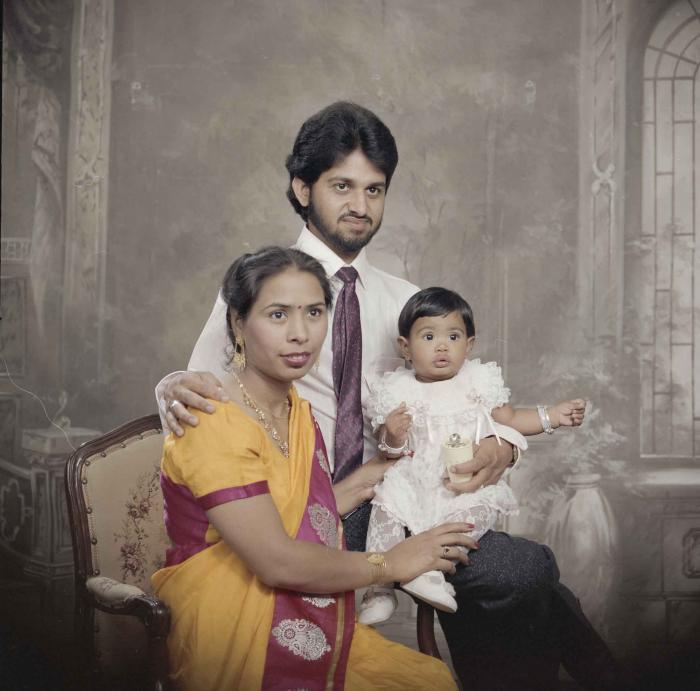 [Portrait of Anju Dhatt, Ashwani Dhaswan and an unidentified child]