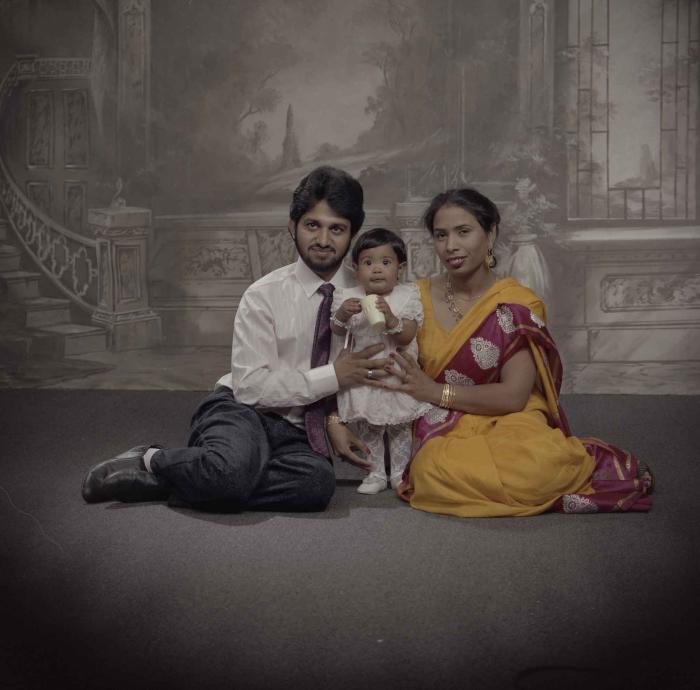 [Portrait of Anju Dhatt, Ashwani Dhaswan and an unidentified child]