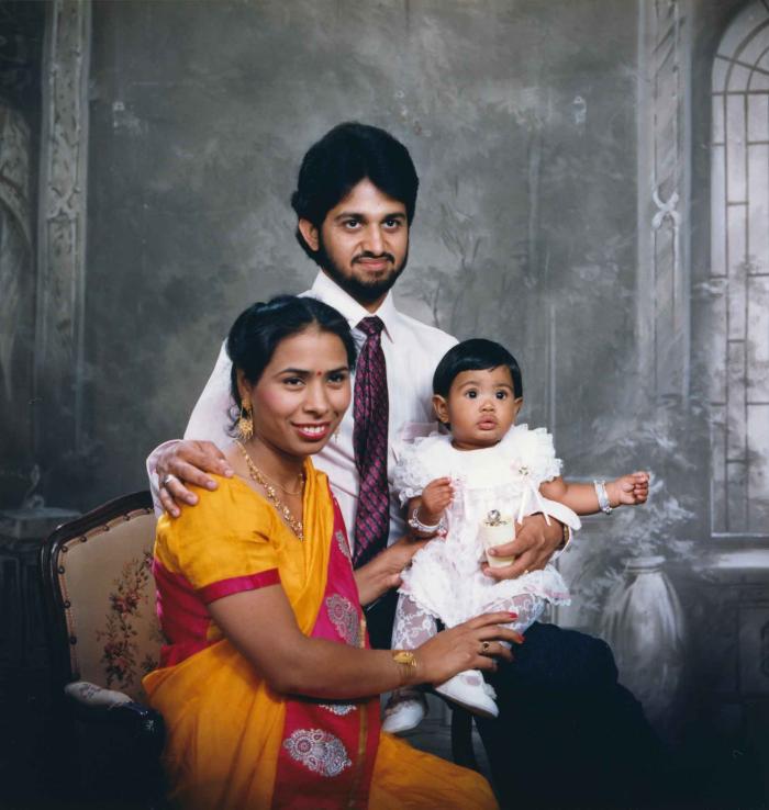 [Portrait of Anju Dhatt, Ashwani Dhaswan and an unidentified child]