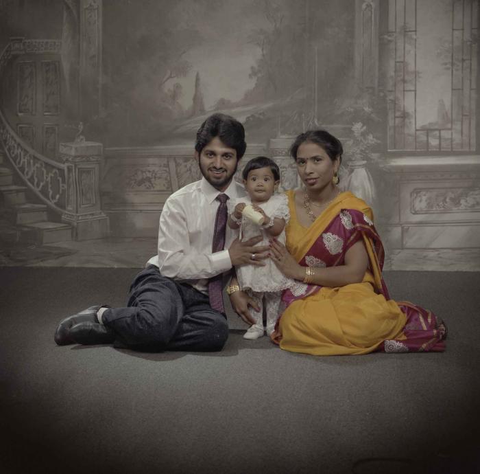 [Portrait of Anju Dhatt, Ashwani Dhaswan and an unidentified child]