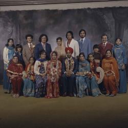 [Group portrait of Narwal Sidhu, an unidentified woman and wedding guests]