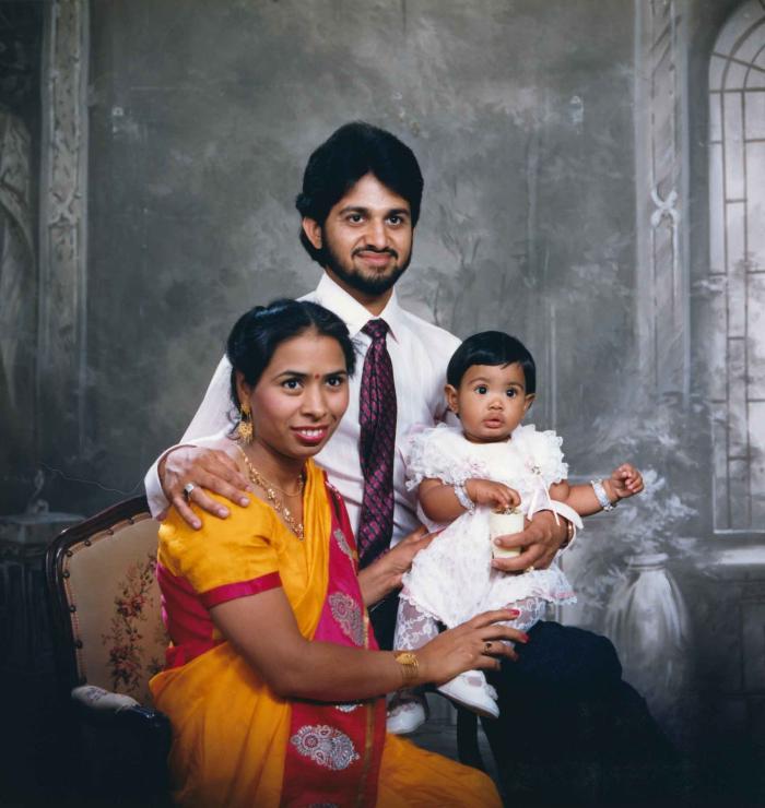 [Portrait of Anju Dhatt, Ashwani Dhaswan and an unidentified child]
