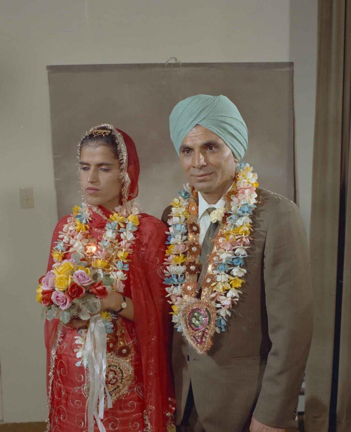 [Group portrait of an unidentified bride and an unidentified groom]