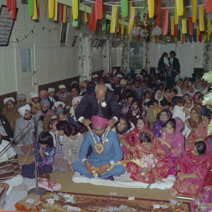 [Photo of Bhagwant S. Grewal, Cindy K. Gill and wedding guests]