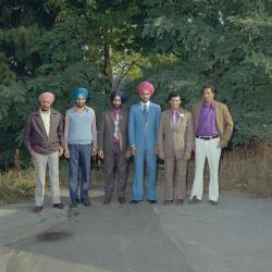[Photo of Bhagwant S. Grewal and five unidentified men]