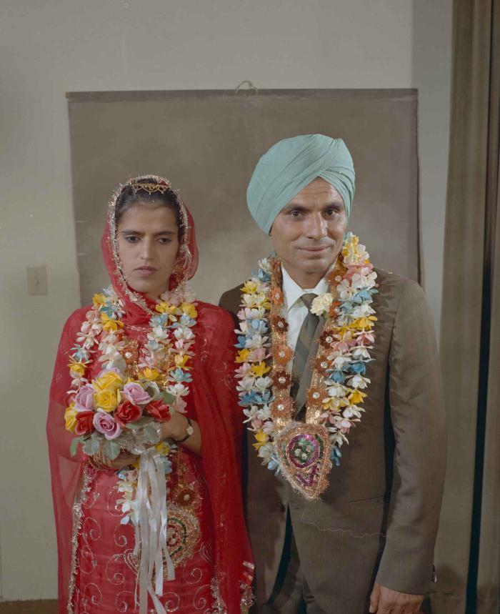 [Group portrait of an unidentified bride and an unidentified groom]