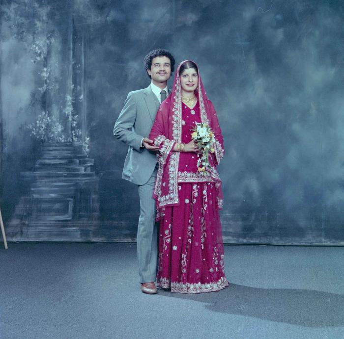 [Group portrait of Charjit Dhillon and an unidentified woman]