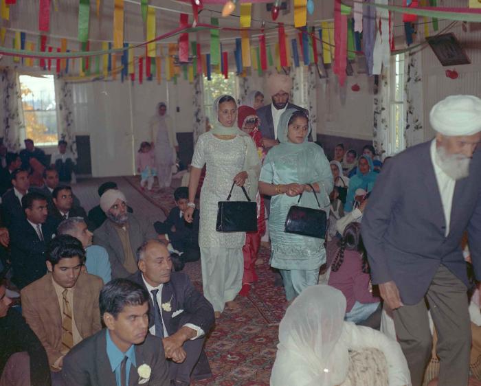 [Photo of an unidentified bride and wedding guests]