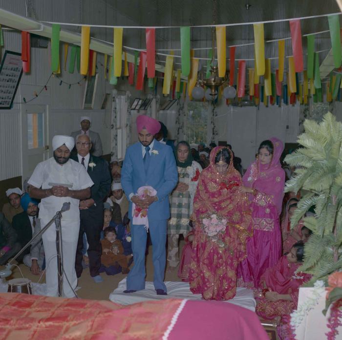 [Photo of Bhagwant S. Grewal, Cindy K. Gill and wedding guests]