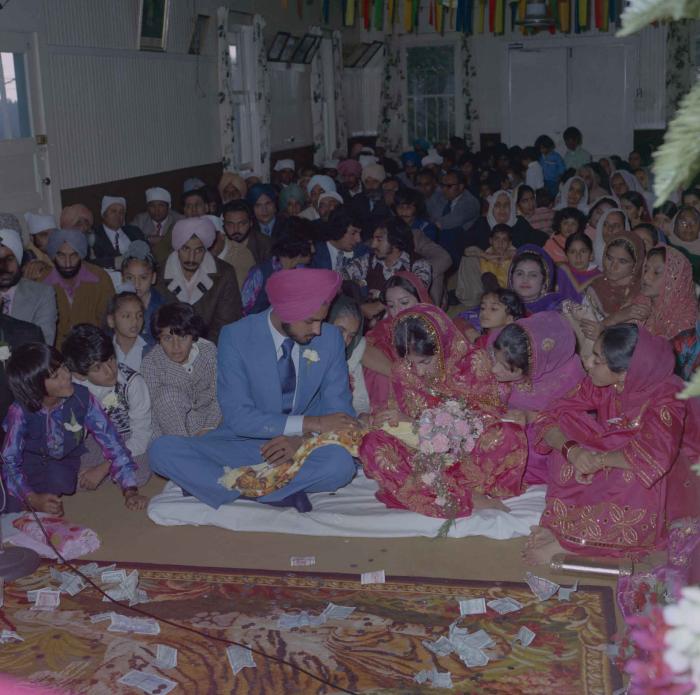 [Photo of Bhagwant S. Grewal, Cindy K. Gill and wedding guests]