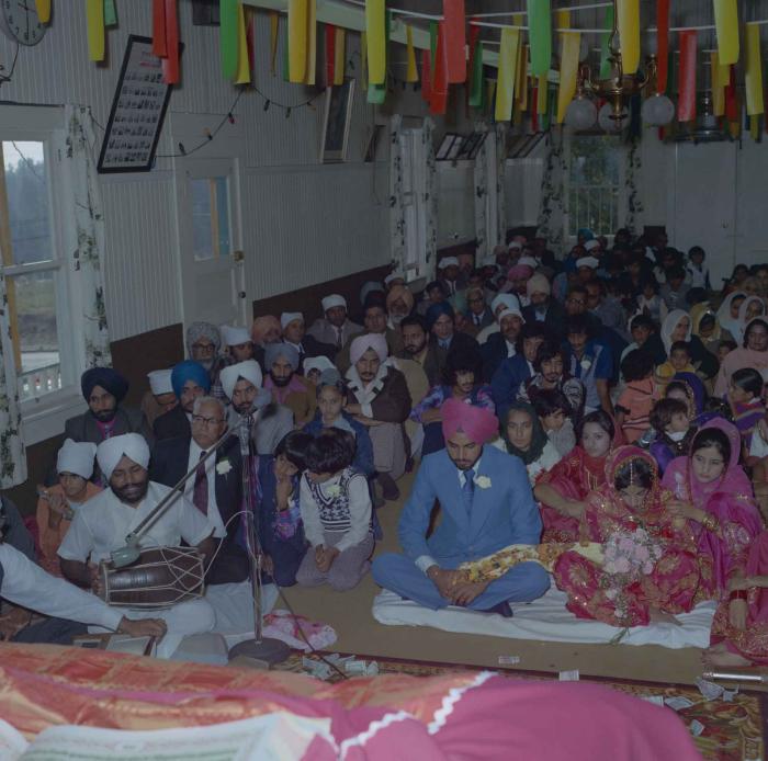 [Photo of Bhagwant S. Grewal, Cindy K. Gill and wedding guests]