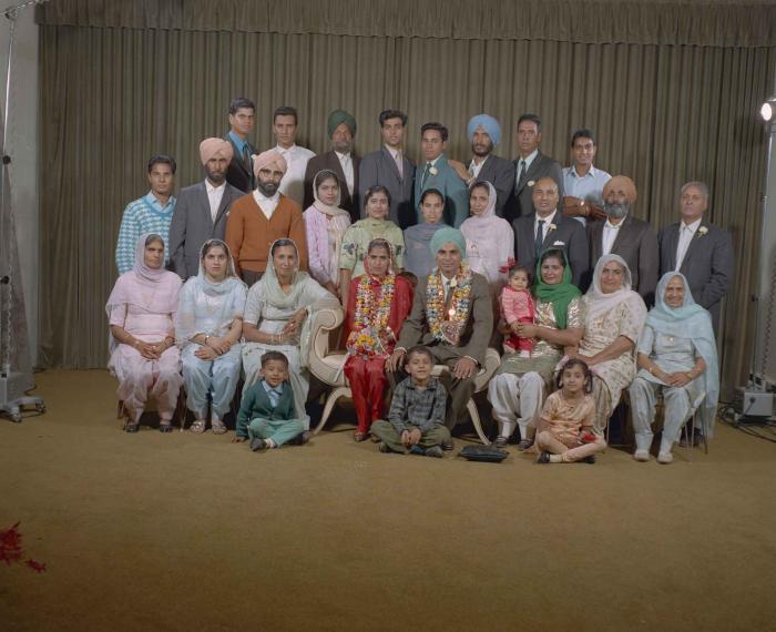 [Group portrait of an unidentified bride, an unidentified groom and wedding guests]
