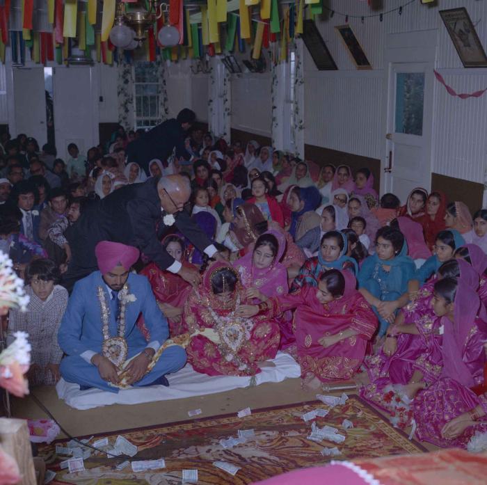 [Photo of Bhagwant S. Grewal, Cindy K. Gill and wedding guests]