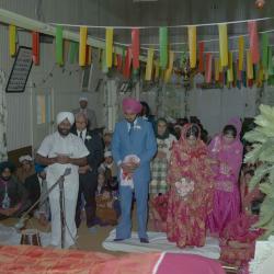 [Photo of Bhagwant S. Grewal, Cindy K. Gill and wedding guests]