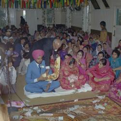 [Photo of Chindo Sidhu and the wedding guests]