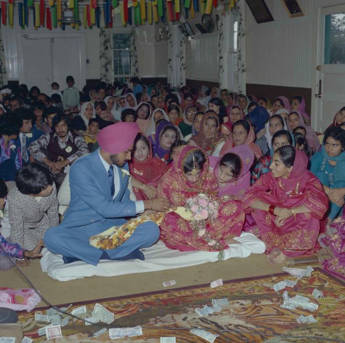 [Photo of Bhagwant S. Grewal, Cindy K. Gill and wedding guests]