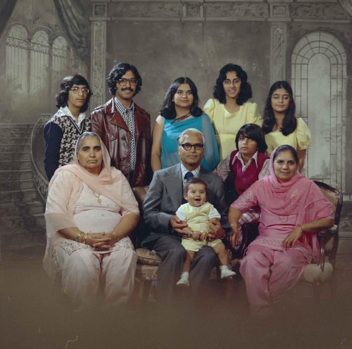[Group portrait of three unidentified men, four unidentified women and three unidentified children]