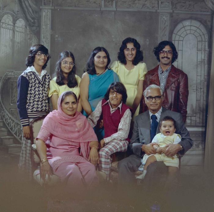 [Group portrait of three unidentified men, three unidentified women and three unidentified children]