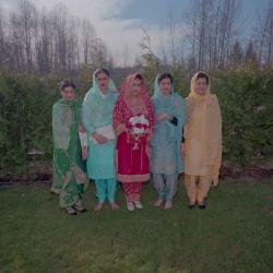 [Photo of Wendy Grewal and four unidentified women]