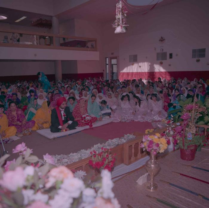 [Photo of Harjinder Gill, Wendy Grewal and the wedding guests]