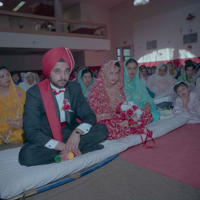 [Photo of Harjinder Gill, Wendy Grewal and the wedding guests]