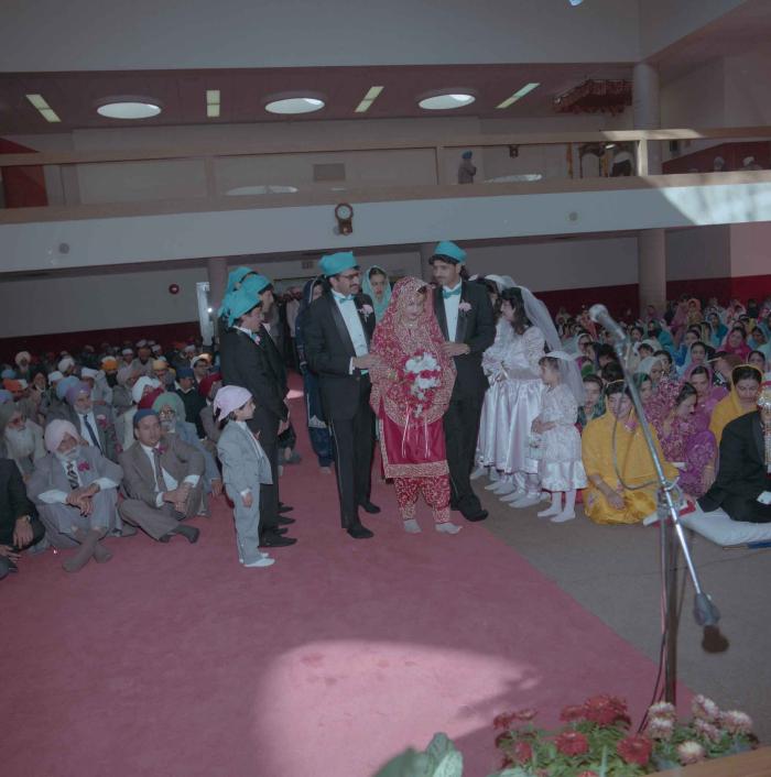 [Photo of Wendy Grewal and wedding guests]