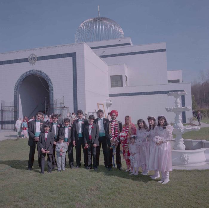 [Photo of Harjinder Gill, Wendy Grewal and the wedding guests]